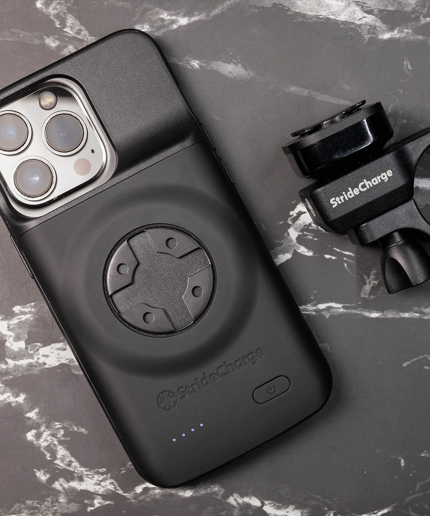 StrideCharge Charge Case and Mount on a black marble table